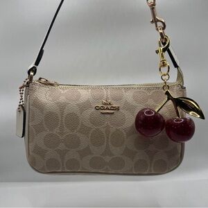 Coach Tan Signature Wristlet (Cherry Charm not included)